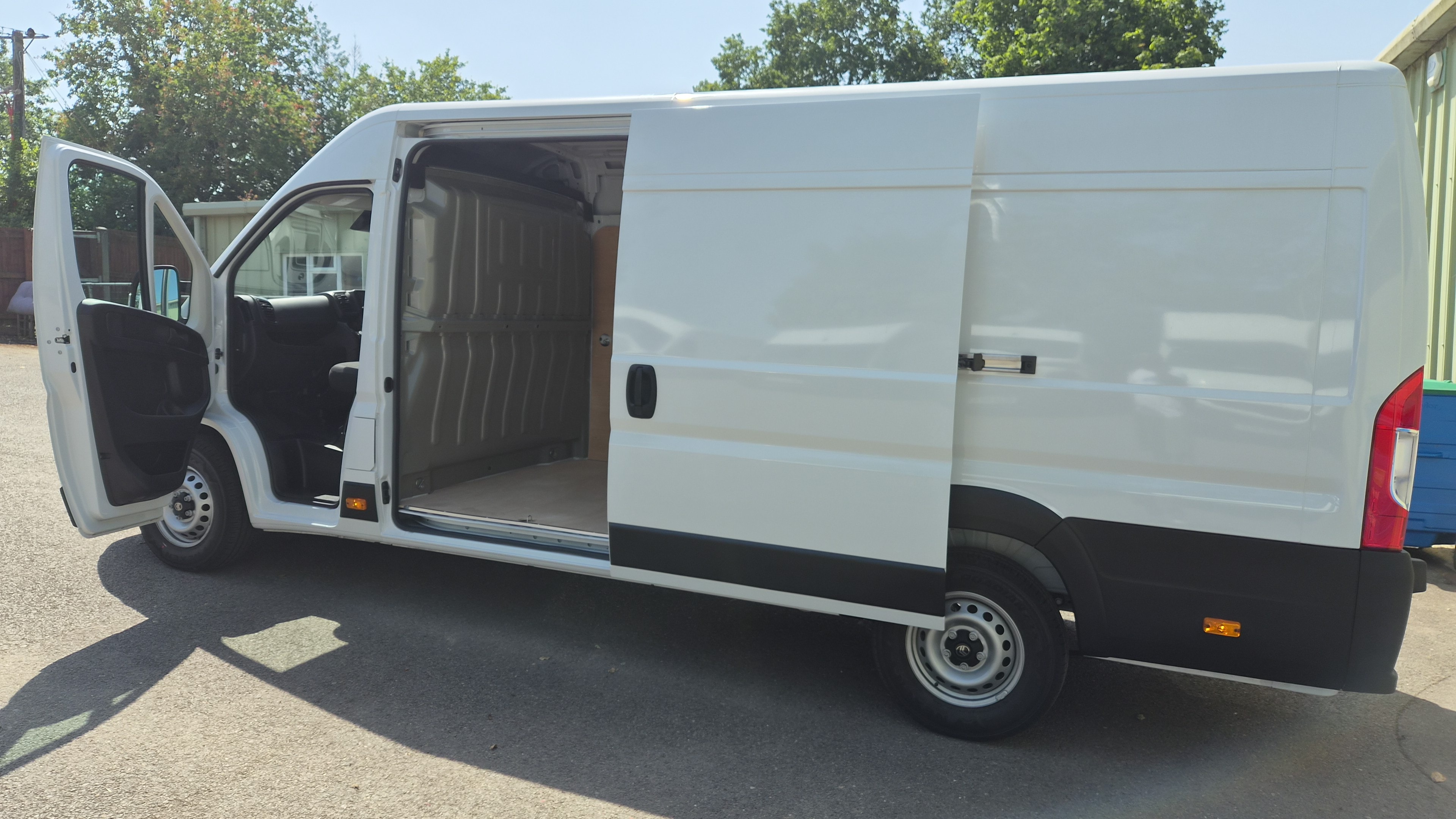 Van side door open showing large load space
